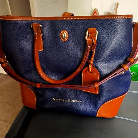 I have a few Dooney & Bourke handbags I never use anymore  Never use Dooney & Bourke tote bag
